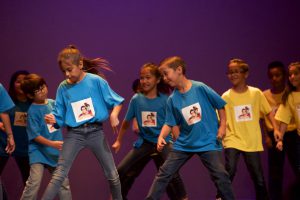 Morse students performing a dance on stage.