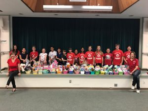 Glenknoll students proudly displaying their care baskets for local seniors.