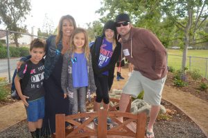 Travis Ranch family at the opening of the reading garden.