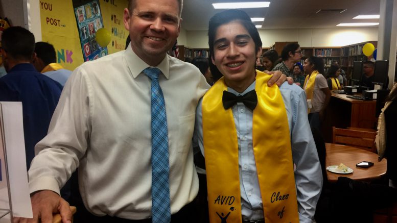 Kraemer Middle School principal with AVID senior at Valencia High.
