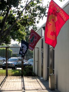 El Dorado High School's campus is covered in college flags.