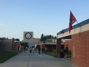 Valencia High School's campus is covered in college flags.
