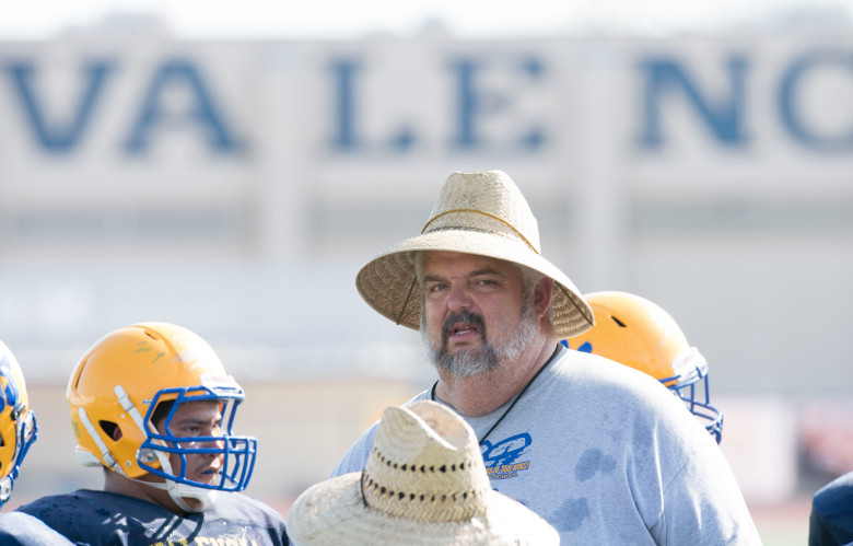 Head football coach Jason Gray talks to his players during practice at Valencia High School in Placentia, CA on Tuesday, September 5, 2017.