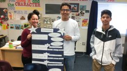 El Camino Real students show off their poster.