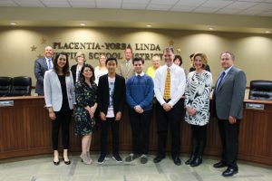 Holocaust Art & Writing first place winners Yoosung Jung (middle left) and Nicholas Franklyn (middle right) with their school site principals and teachers.