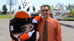 Principal Jose Cabrera with Anaheim Ducks' mascot, Wild Wing.