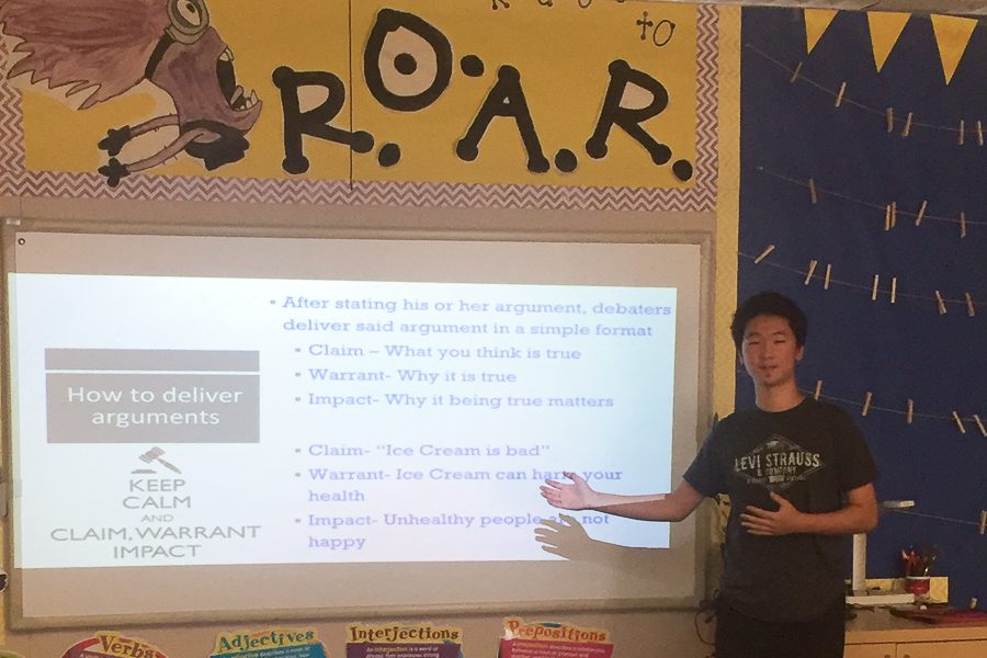 Valencia student Aaron Chew discussing speech and debate at Lakeview Elementary.