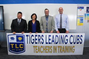 Valencia's admin team including Jeff Louie, Olivia Yaung, Mike Young, and Chris Herzfeld.