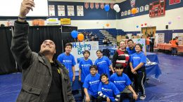 Valadez Middle School Academy principal, Cuco Gracian, snaps a selfie with a few of his students at the AppJam+ Fall Showcase Finale.