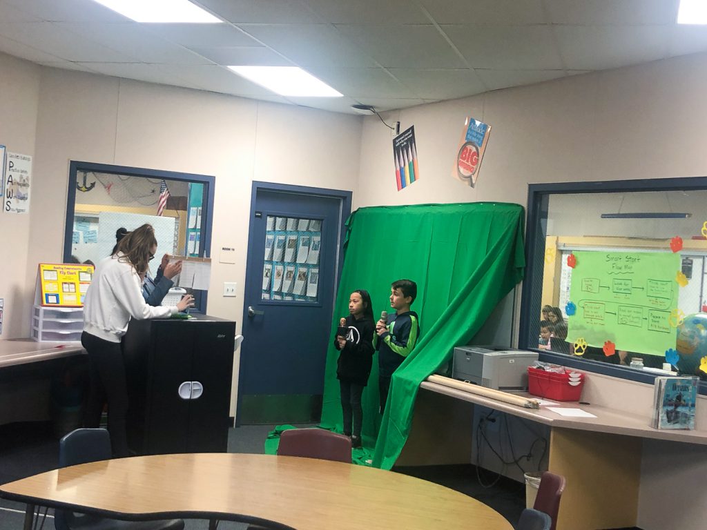 Glenview students filming a project.