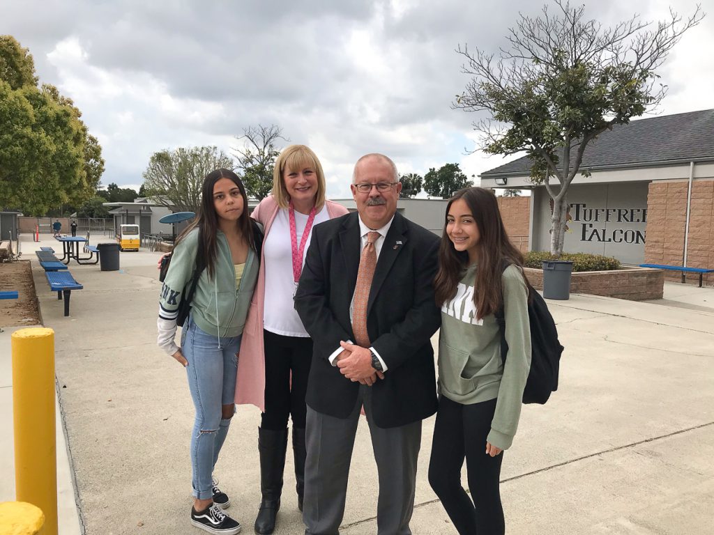 Tuffree Middle School's Principal for a Day, Ward Smith, with staff and students.