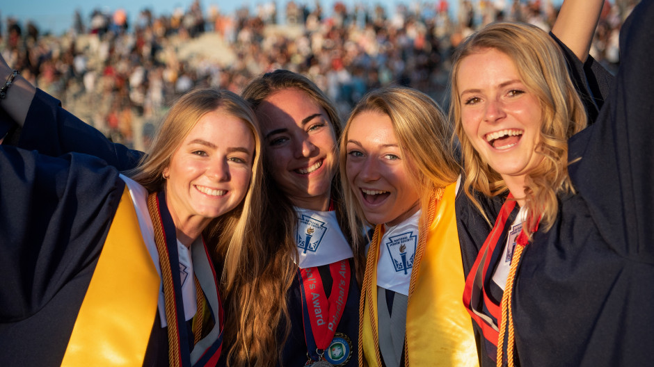 Friends Allison Provenzano, Courtney Huitt, Michelle Quinn and Payton Janish, from left, celebrate together on the fiend following their Commencement Ceremony at Yorba Linda High School on Wednesday, June 12, 2019. (Photo By Jeff Antenore, Contributing Photographer)