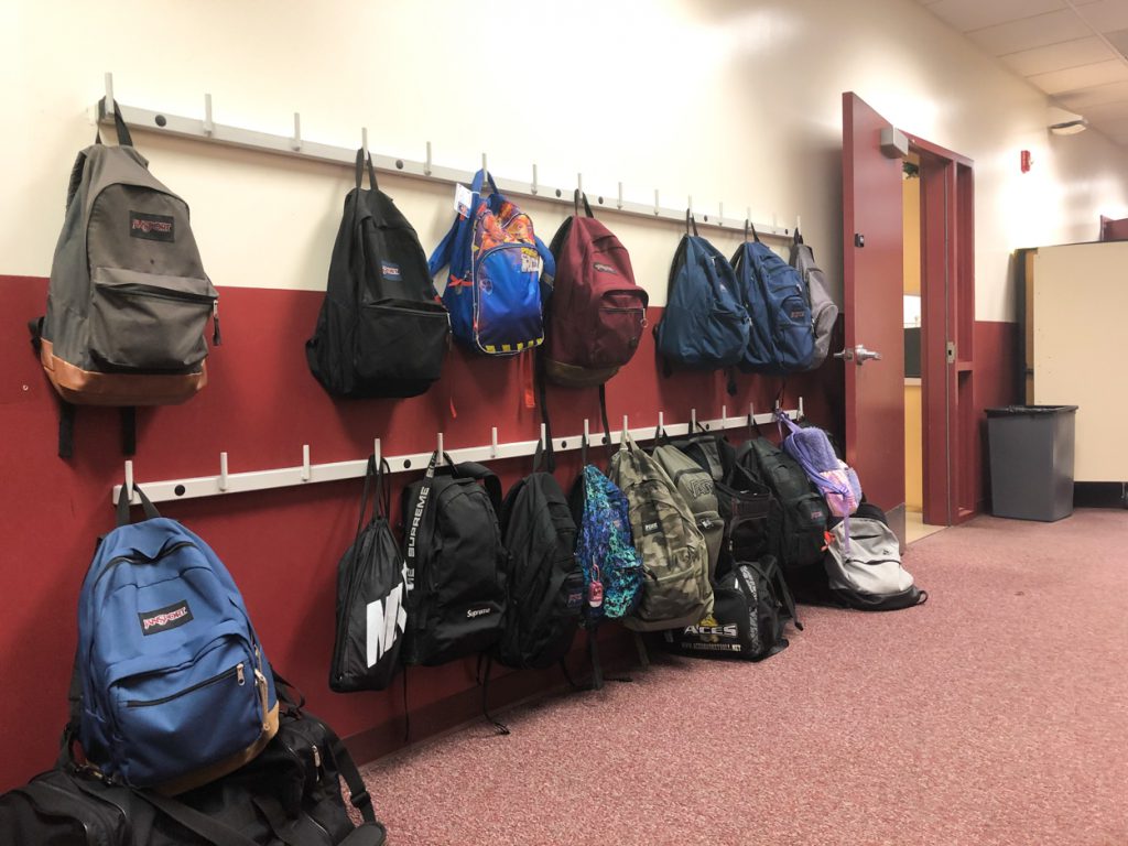 EHS AEMA students with backpack racks.