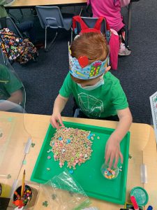 The Preppy K scholars at Van Buren Elementary were in for a (mischievous) treat on St. Patrick’s Day! They started off by finding that their classroom had been turned “upside down”, courtesy of the Preppy K Leprechaun! After all the commotion, the students decided to put their math skills to use by sorting, graphing and counting colorful Lucky Charms marshmallows. Nothing beats exciting, interactive math on St. Patrick’s day!