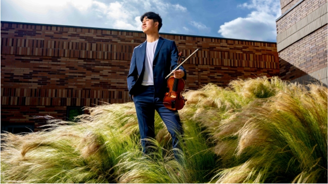 Aaron Kim, a senior at Valencia High School, is the 2022 Artist of the Year in instrumental music. Kim is shown at Chapman University in Orange on Sunday, April 10, 2022.