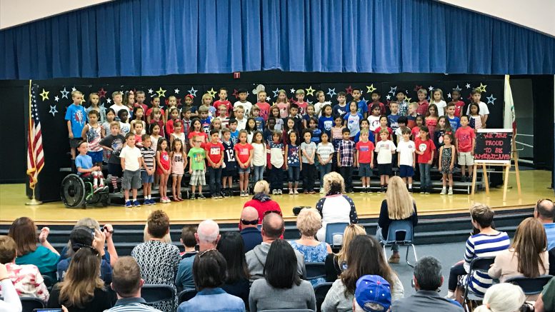Bryant Ranch Elementary first graders putting on a patriotic performance.