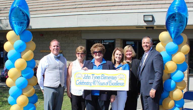 (L-R) Assistant Superintendent of Human Resources, Kevin Lee, former Tynes Principal, Beth Berndt, Tynes Principal, Dr. Debbie Silverman, Tynes Assistant Principal, Jacque Bluemel, Deputy Superintendent, Candy Plahy, and Superintendent, Dr. Greg Plutko celebrated John O. Tynes Elementary School's 40th anniversary on Friday, September 29.