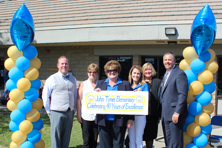 (L-R) Assistant Superintendent of Human Resources, Kevin Lee, former Tynes Principal, Beth Berndt, Tynes Principal, Dr. Debbie Silverman, Tynes Assistant Principal, Jacque Bluemel, Deputy Superintendent, Candy Plahy, and Superintendent, Dr. Greg Plutko celebrated John O. Tynes Elementary School's 40th anniversary on Friday, September 29.
