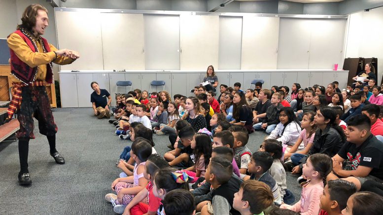 Ruby Drive Elementary students watching an opera performance.