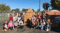 Golden ES students collecting food.