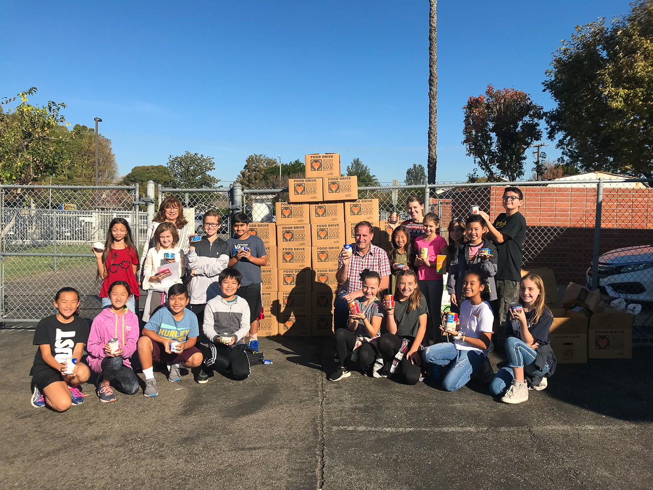 Golden ES students collecting food.