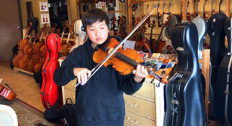 Jimmy Joo on the violin.