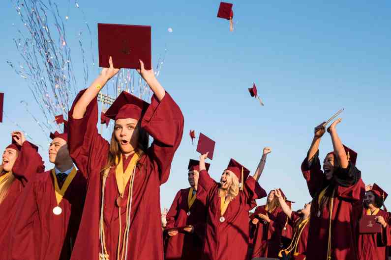Esperanza High School graduates celebrate during the closing moments of a commencement ceremony inside the Nathan Shapell Memorial Stadium at Yorba Linda High School on Thursday, June 13th, 2019. (Michael Ares, Contributing Photographer)