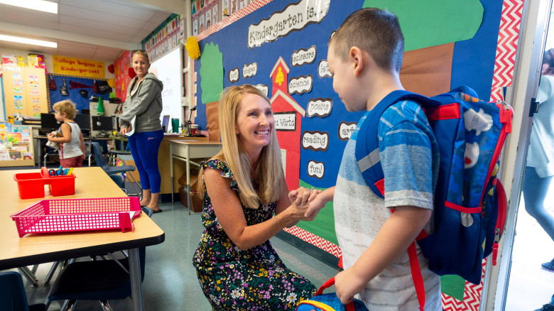 Jaxson Munroe, 5, greets his teacher, Kim Griffin, on the first day of kindergarten at Sierra Vista Elementary School in Placentia, CA on Tuesday, August 27, 2019. (Photo by Paul Bersebach, Orange County Register/SCNG)