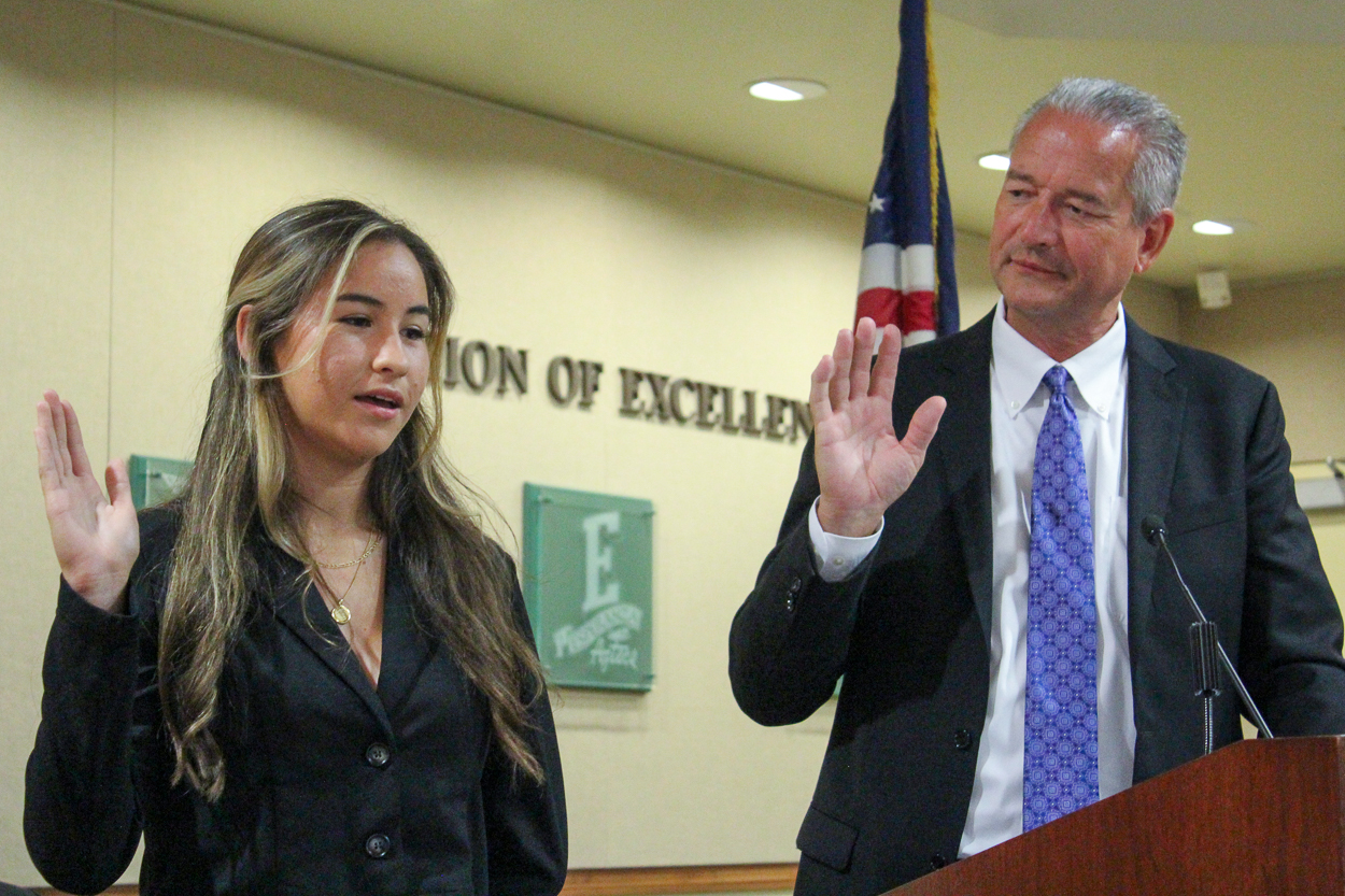 Lauren Farer takes her Oath of Office with Superintendent Dr. Jim Elsasser at the July 27, 2021, Board of Education Meeting.