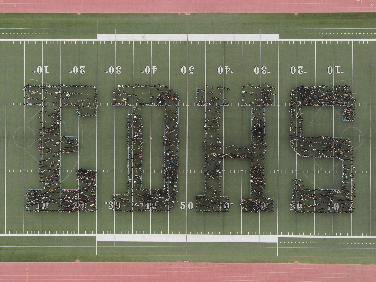 El Dorado High School's entire student body and staff formed a giant E D H S on the first day of the 2021-2022 school year.
